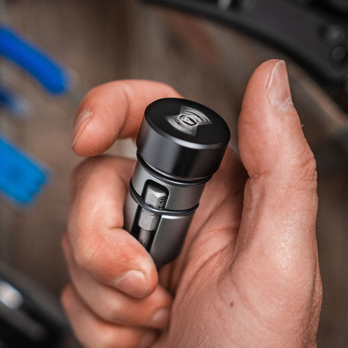 Close-up of hand holding Bit Driver Grande bit driver tool